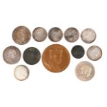 A small collection of coins and other numismia, comprising: Britain: George III, silver crown, 1818,