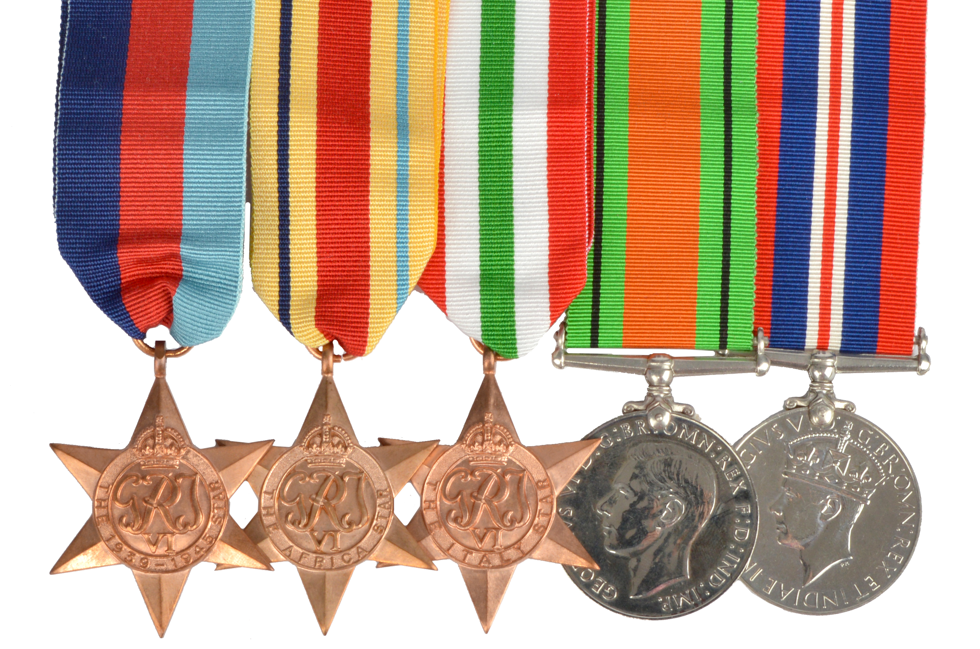 A recently issued group of WWII campaign medals, comprising: 1939-45 Star, Africa Star, Italy