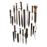 A collection of various bayonets, comprising: a German model 98/05, broad blade and steel