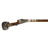 A South Arabian matchlock musket, sighted barrel 43 in., retained to the stock by broad silver