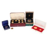 A collection of gold coins and commemorative medals, comprising: George III, guinea, 1788 (S