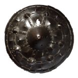 Henry VIII of England: a rare and historically important gun shield. A convex circular shield, or