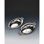 ? A pair of Guild of Handicrafts silver-plated copper and ivory tureens designed by Charles Robert