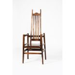 An oak armchair in the manner of Charles Frances Annesley Voysey, square plank seat on tapering