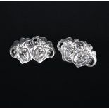 A pair of Jugendstil silver cuff-links designed by Julius Muller-Salem, each link cast in low relief