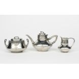 An Art Nouveau Urania pewter three piece tea set designed by Hugo Leven, model no.1042, cast in