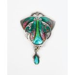 A Smith and Ewen silver and enamel Secessionist pendant, floriform, pierced and cast in low