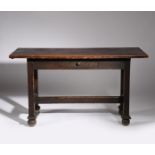 An oak table designed by Charles Frances Annesley Voysey, designed for the Essex and Suffolk
