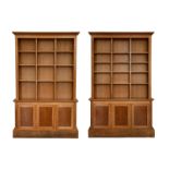 A fine pair of Linley oak bookcases, each with adjustable shelves over burr walnut and ebony