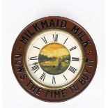 Milkmaid Milk Now's the Time to Buy an advertising wall clock, circular form, stamped in low relief,