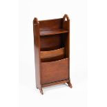 A mahogany magazine rack, tall, slender rectangular form with pierced decorative panels, 87cm. high,