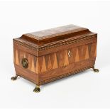 ? A Tunbridge Ware marquetry Sarcophagus shape tea caddy, on brass claw feet, rectangular with