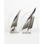 ‡ John Mellows (born 1945) Racing Yacht a pair of polished steel sculptures unsigned 67cm. high, (