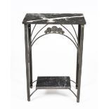 An Art Deco patinated wrought iron and marble table by G Pion, rectangular section, the wrought iron