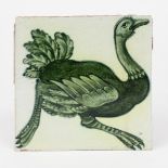 A William De Morgan Late Fulham Period Running Ostrich tile, painted in green on a white ground,