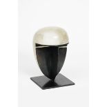 ‡ Keith Newstead (born 1943) Poet's Head 7, Helmet English alabaster and patinated steel incised