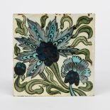 An early William De Morgan Persian Chelsea Period Roumelian tile, painted with stylised flowers