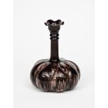 An Ault Pottery Garlic vase designed by Dr Christopher Dresser, model no.828, moulded, ribbed