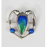 A George Houston silver and enamel pendant, shield shaped central panel with pierced scroll