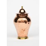 A Birmingham Guild of Handicraft copper and brass vase and cover, swollen copper baluster shaped