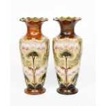 A pair of Art Nouveau Doulton Lambeth stoneware vases by Elisa Simmance, shouldered form, slip