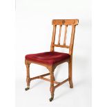 An oak side chair designed by Augustus Welby Northmore Pugin, chamfered decoration, on square