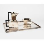A Charles Boyton Modernist electroplated four piece tea service on tray, square section on stepped