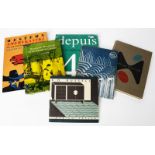 A collection of art and design reference books, including Handmade Woodwork of the 20th Century by A