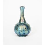 A Loetz glass vase, ovoid with waisted cylindrical neck, covered in a combed iridescence,