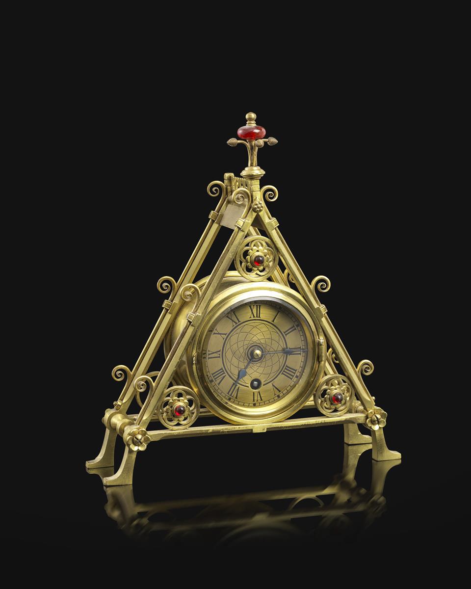 A rare Reformed Gothic brass mantel clock designed by Bruce Talbert, probably manufactured by