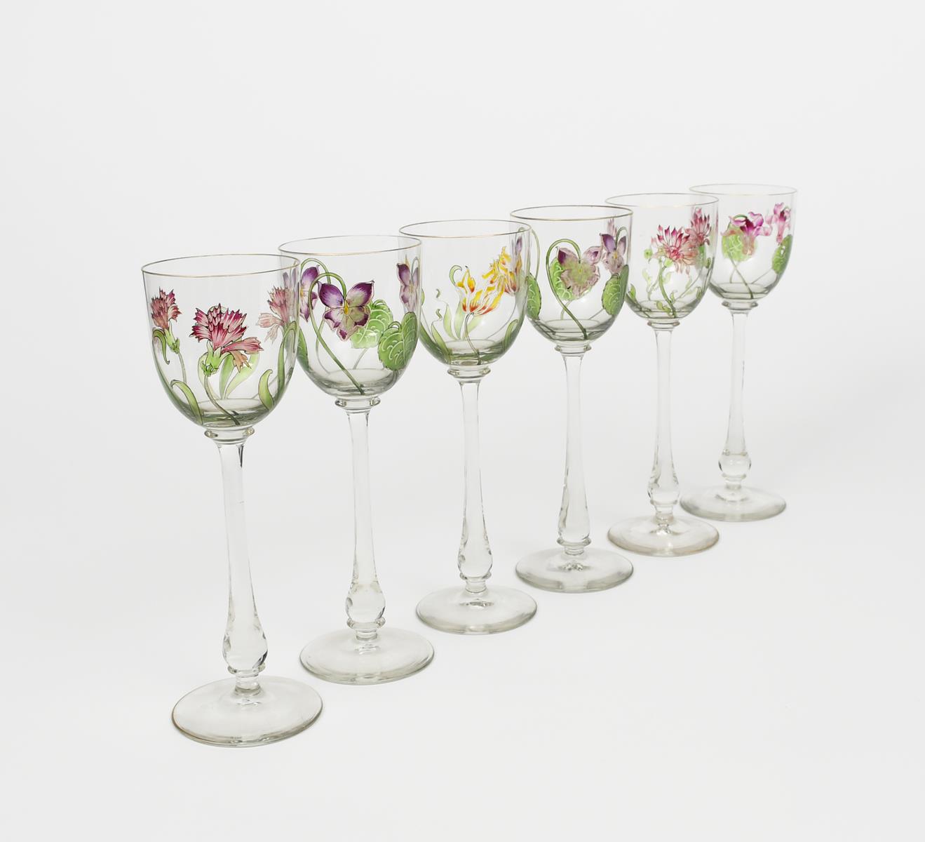 A set of six enamelled glass wine glasses the design attributed to Helen or Hannah Walton, the clear