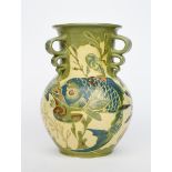 A large C H Brannam Pottery vase by James Dewdney, dated 1894, ovoid with cylindrical neck, the neck