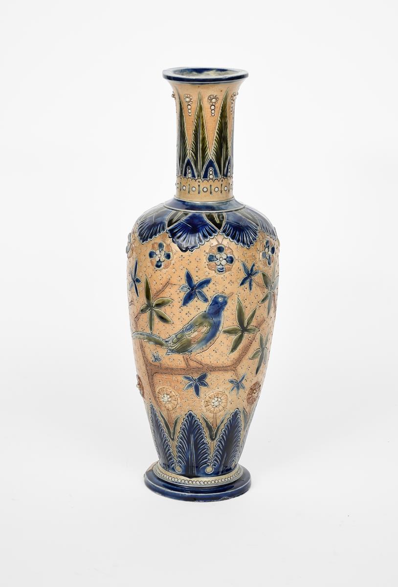 A Fulham Pottery stoneware vase, slender baluster form, incised with a bird perched on a tree bough,