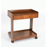 A mahogany serving trolley in the manner of Gerald Summers for Makers of Simple Furniture,