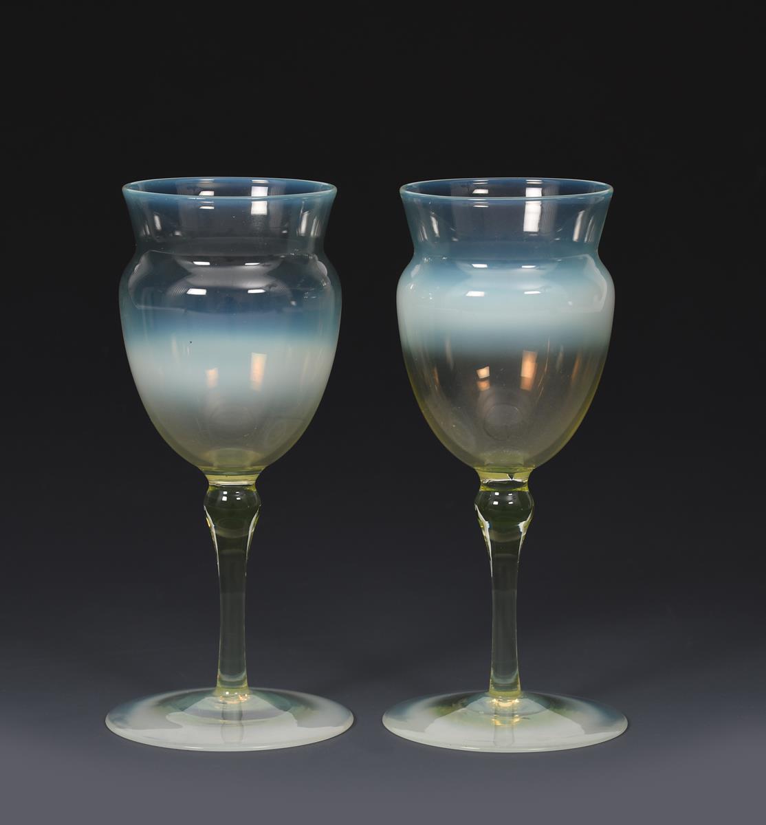 A pair of James Powell & Sons Whitefriars straw opal wine glasses designed by T G Jackson, with