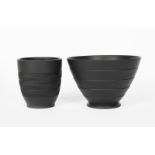 A Wedgwood Pottery black basalt bowl designed by Keith Murray, shape no.3753, flaring banded bowl on