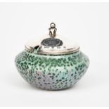 A Ruskin Pottery high-fired stoneware pot by William Howson Taylor with silver cover by A E Jones,