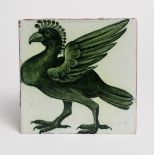 A William De Morgan Late Fulham Period Great Curassow tile, painted in shades of green on a white