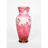 An Art Nouveau Baccarat acid-etched cameo glass vase, shouldered form with flaring conical neck,