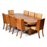 An Epstein satinwood table and eight chairs designed by Harry & Lou Epstein, panelled veneer, shaped