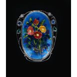 An impressive large George Hunt silver and enamel brooch, dated 1929, the oval wirework frame with