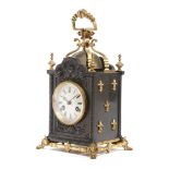 A FRENCH GILT BRASS MOUNTED CARRIAGE CLOCK IN GOTHIC REVIVAL STYLE LATE 19TH CENTURY the brass