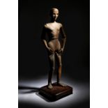A FRENCH LIFE SIZE CARVED PINE ARTIST'S LAY FIGURE 19TH CENTURY with articulated head, limbs,