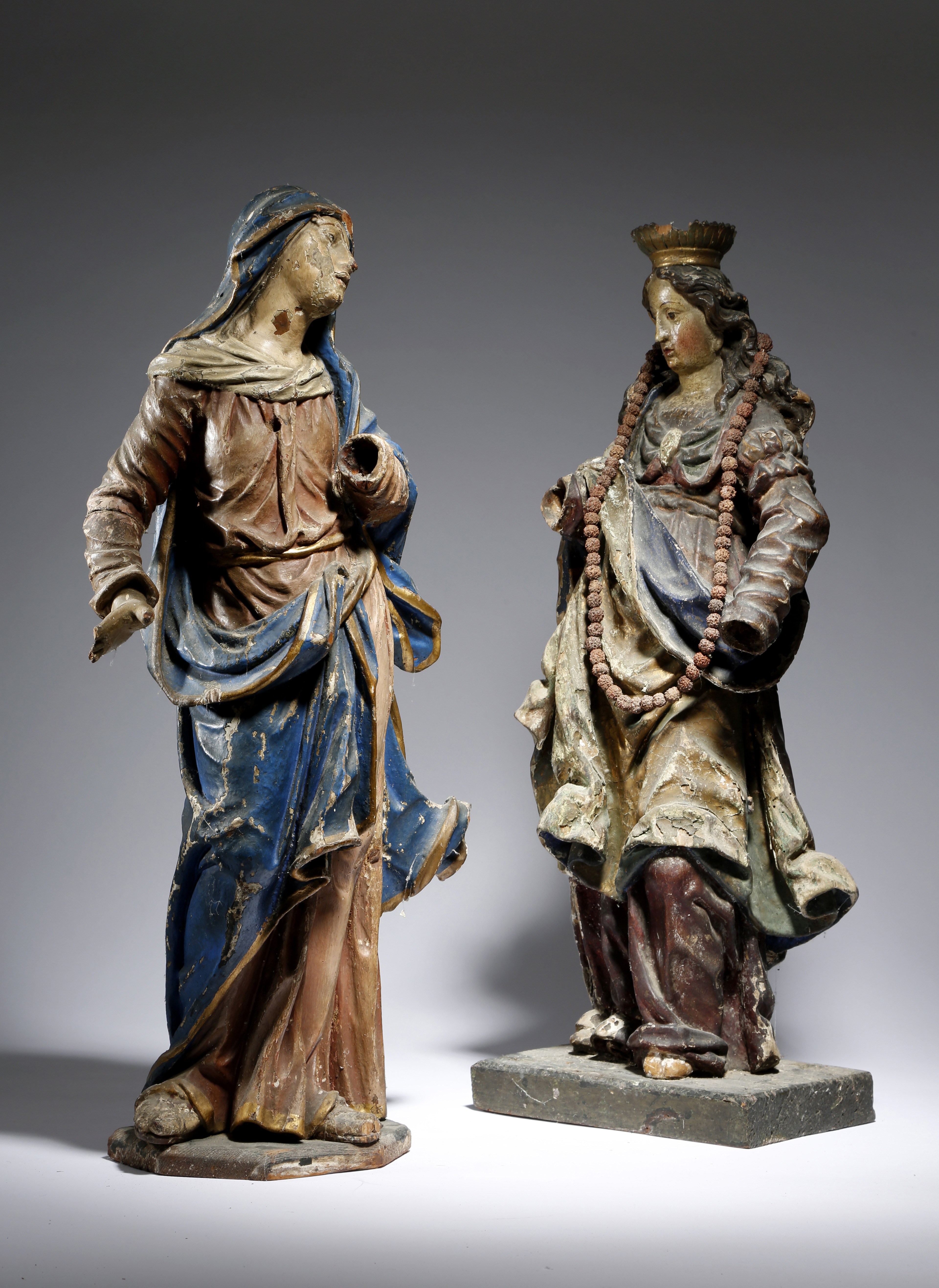 TWO EUROPEAN CARVED WOOD AND POLYCHROME DECORATED FIGURES ITALIAN OR SPANISH, LATE 17TH / EARLY 18TH