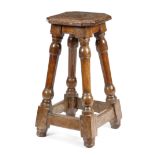 A WALNUT AND BEECH HIGH JOINT STOOL PROBABLY LATE 17TH / EARLY 18TH CENTURY the seat with canted