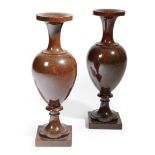 A PAIR OF VICTORIAN CORNISH SERPENTINE VASES C.1890 with flared rims and turned ovoid bodies, on
