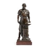 A BRONZE FIGURE OF A BLACKSMITH BY FRIEDRICH WILHELM ALBERMANN (GERMAN 1835-1913) the bearded figure