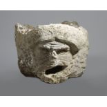 AN ITALIAN ISTRIAN STONE FOUNTAIN HEAD POSSIBLY 17TH CENTURY OR EARLIER the spout carved with a