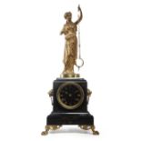 A FRENCH BLACK MARBLE MYSTERY CLOCK BY GUILMET, LATE 19TH CENTURY the brass drum eight day