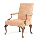 A MAHOGANY LIBRARY ARMCHAIR IN GEORGE III STYLE LATE 19TH CENTURY with a padded back, seat and